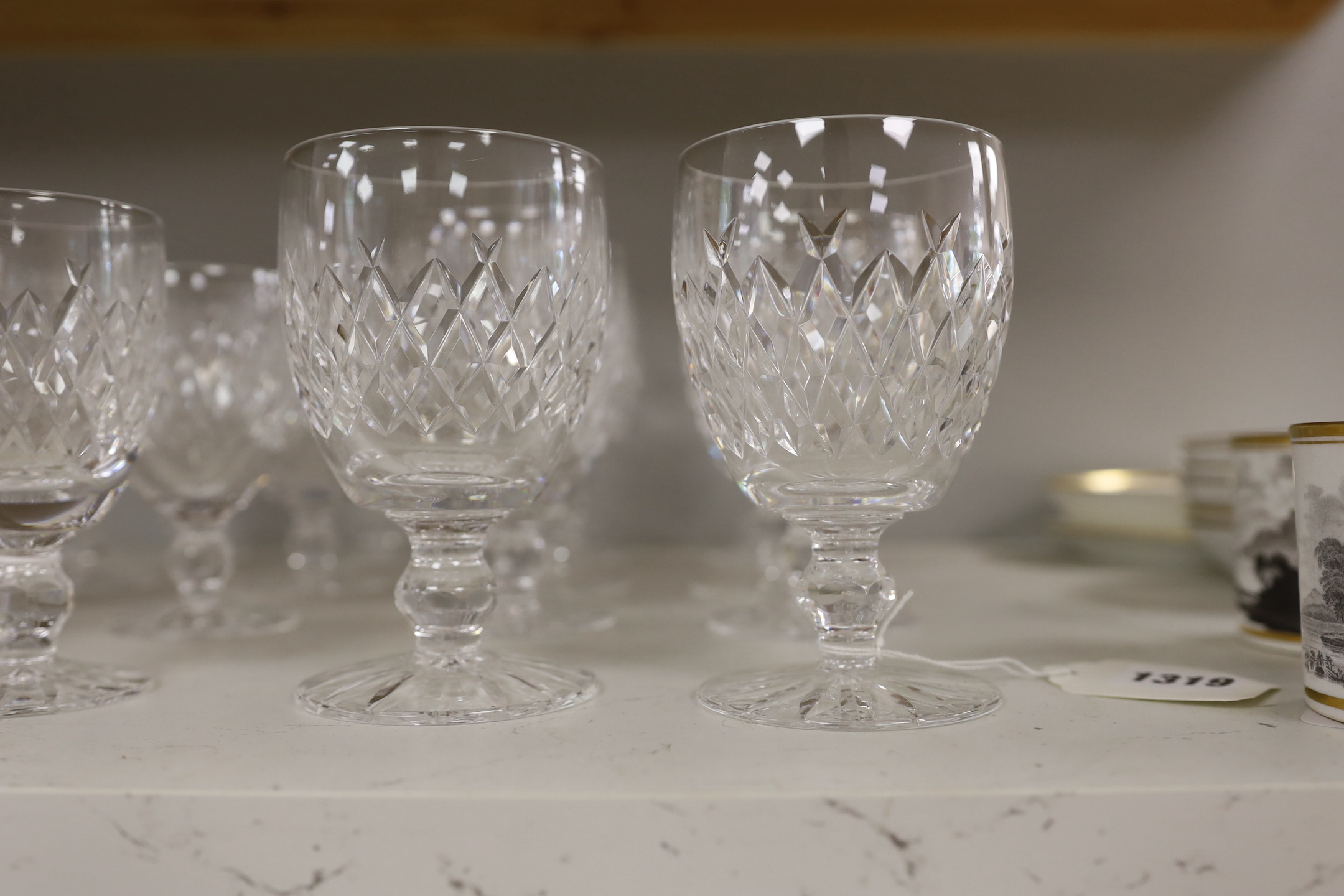 Sixteen Waterford crystal glasses, tallest 13cm high